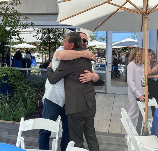 Jay Madison and Waldo Romero capture 15 years of friendship in a final embrace. 